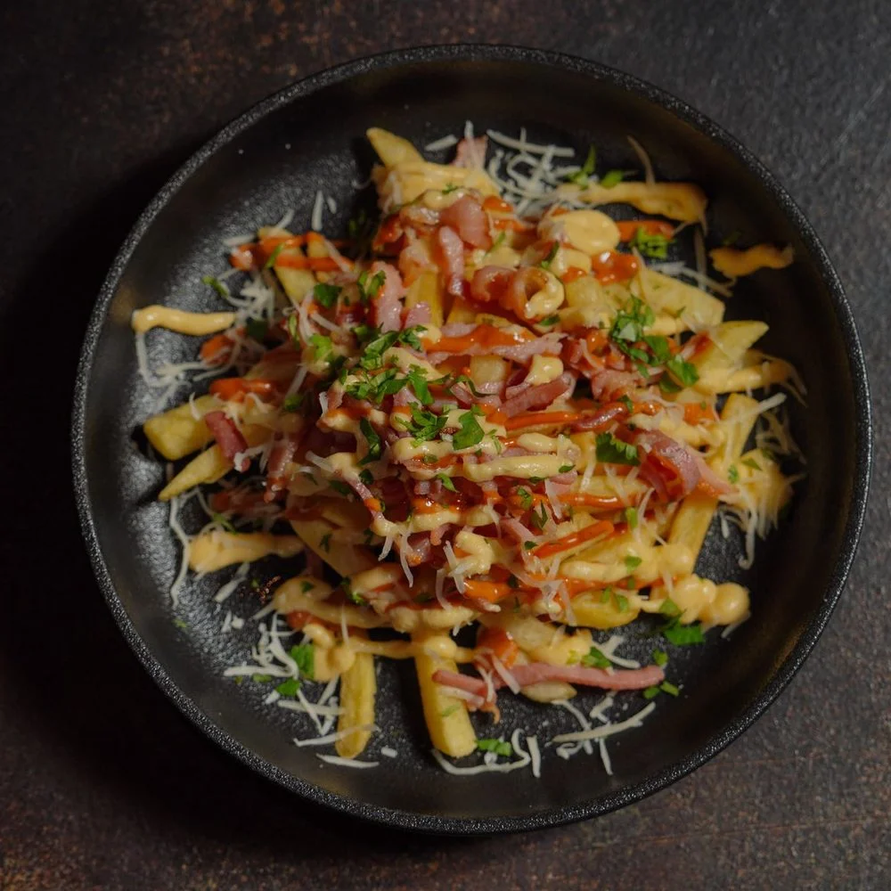 Papas con queso y tocino